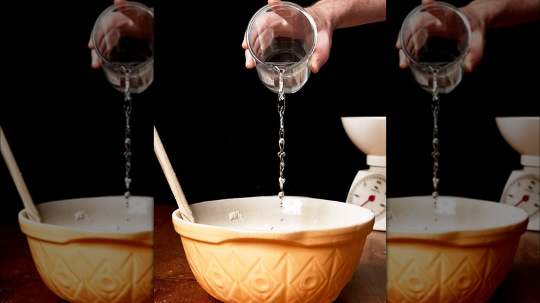 pouring water into bowl