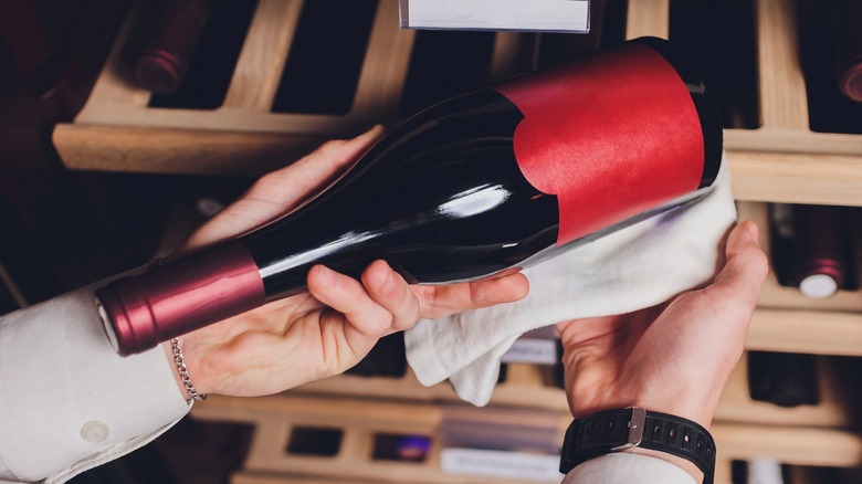 Sommelier with wine bottle