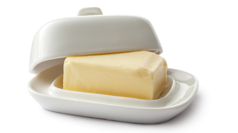 stick of butter in butter dish