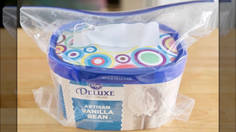 Ice cream carton in a plastic bag