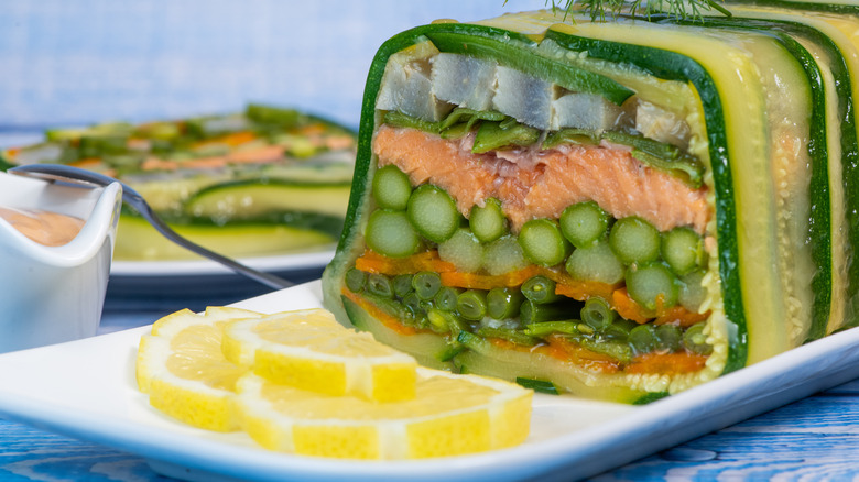 Vegetables and fish encased in jello