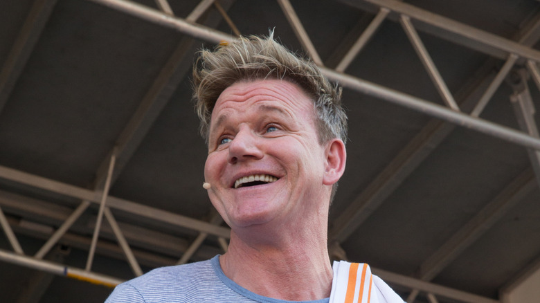 Gordon Ramsay smiling on stage.