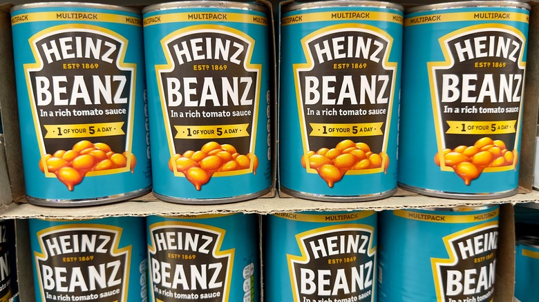Stacked cans of Heinz Beanz