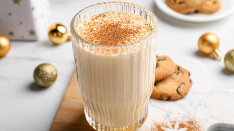 Glass of eggnog with cinnamon