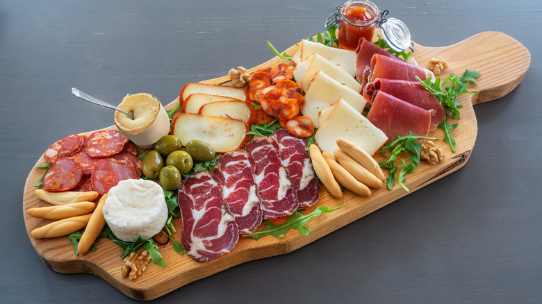 Charcuterie board with meats and cheeses