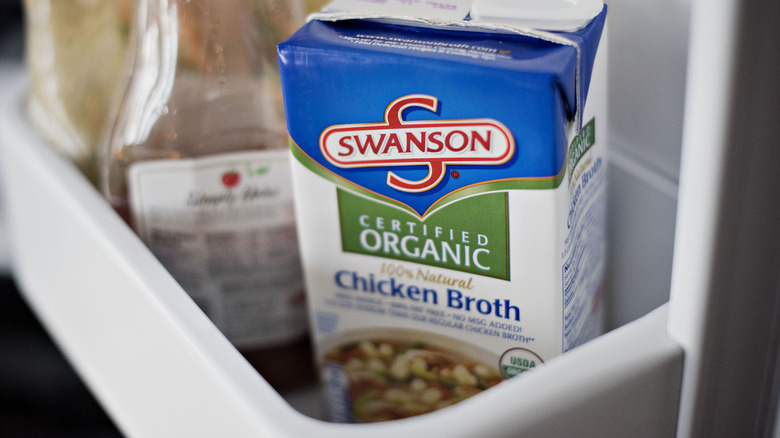 boxed chicken broth in refrigerator door