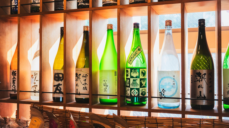 Colorful sake bottles on display