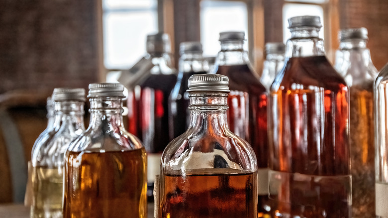 Spirits in small, unlabeled glass bottles