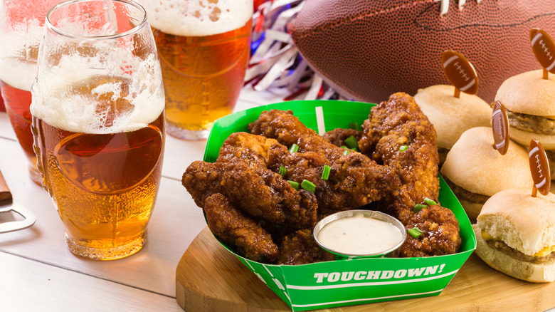 Chicken wings, beer, football themed sliders, and a football