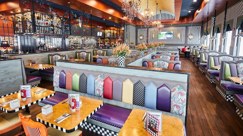 Colorful booths and chandeliers inside the diner