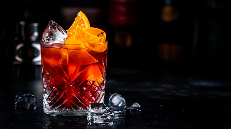 A Negroni cocktail with an orange garnish