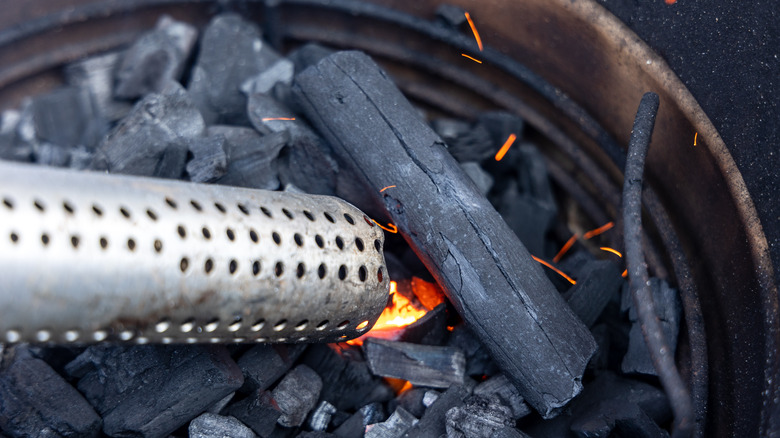Electric grill torch lighting coals
