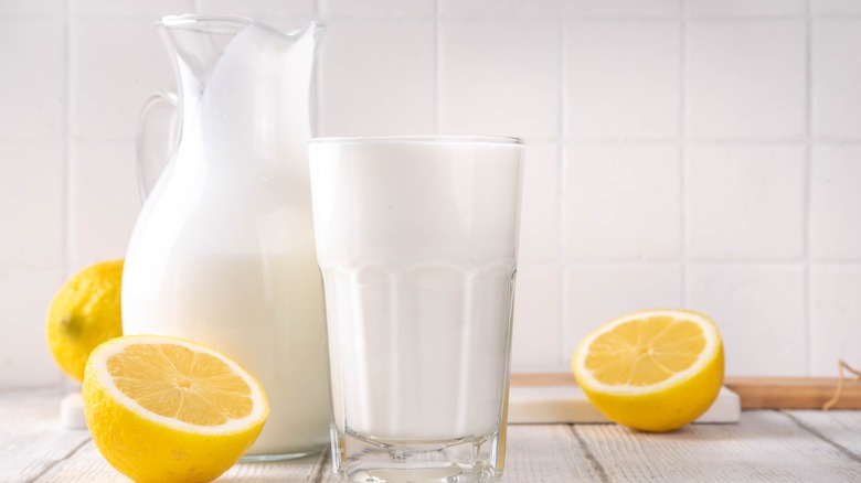 Buttermilk in containers and lemons