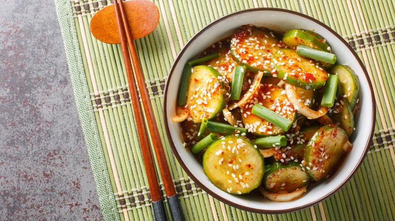 Cucumber salad on bamboo mat