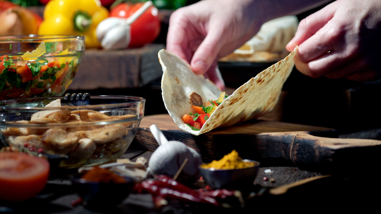 Filling a fresh tortilla