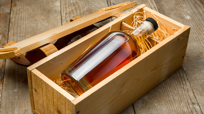 Bourbon bottle in wood box