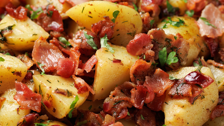 Crispy bacon bits on potato salad