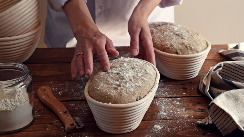 Chef working with bread proofing basket