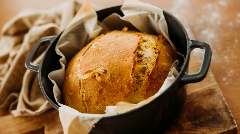 Fresh bread loaf in a Dutch oven