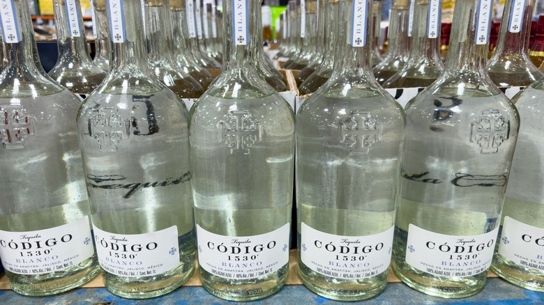 Bottles of blanco tequila on a store shelf