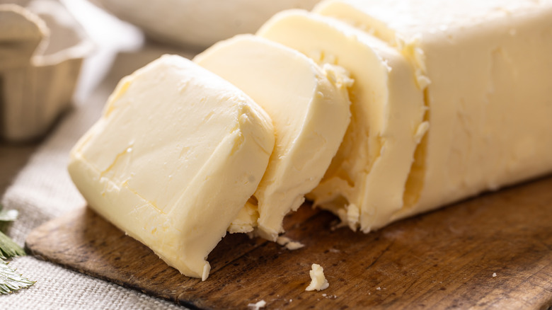 Sweet cream butter, also called American butter, on a cutting board