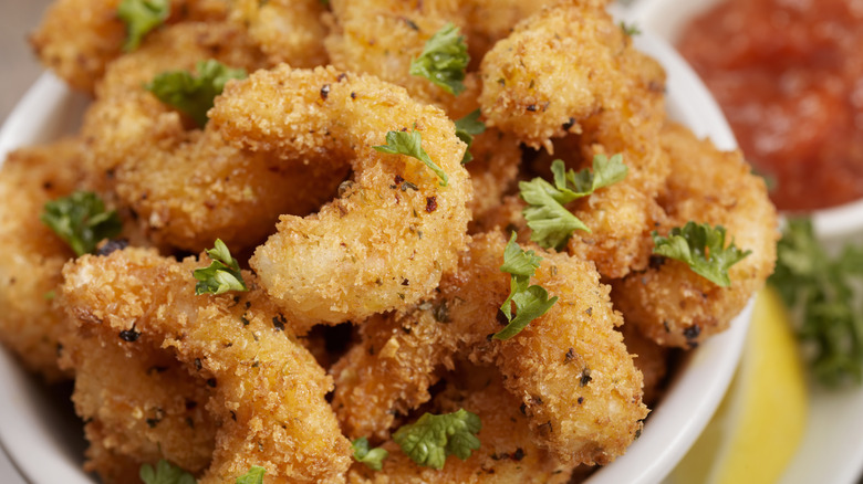 Plate of fried shrimp with parsley