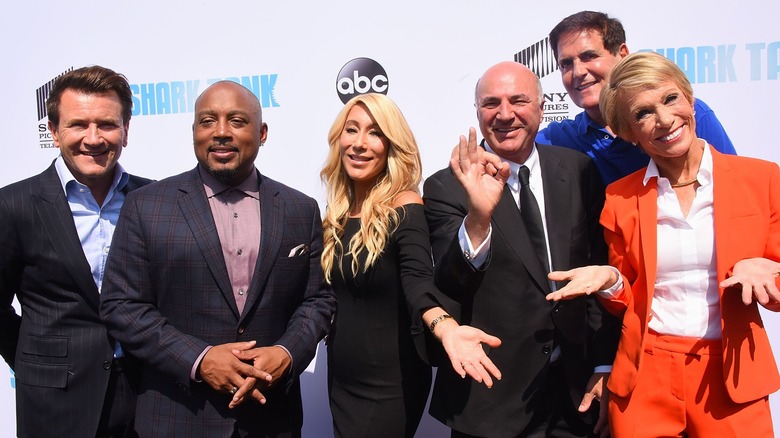 Cast of Shark Tank posing for photo