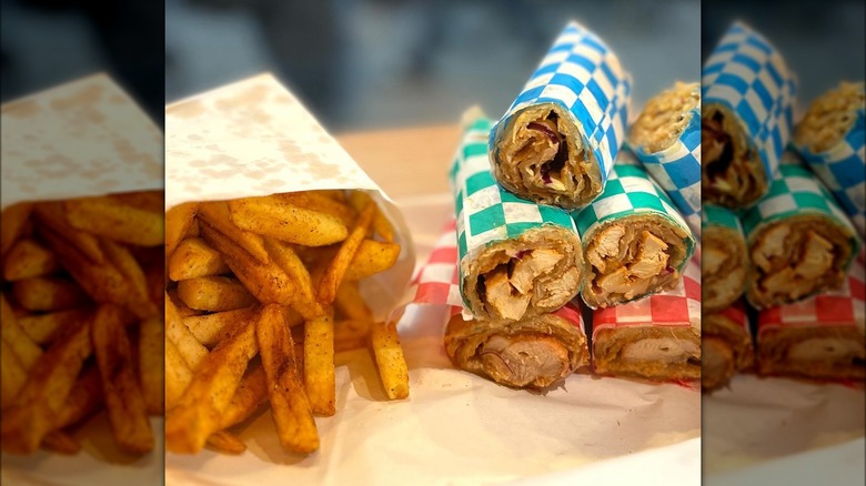 kolachi rolls and fries on checkered tablecloth