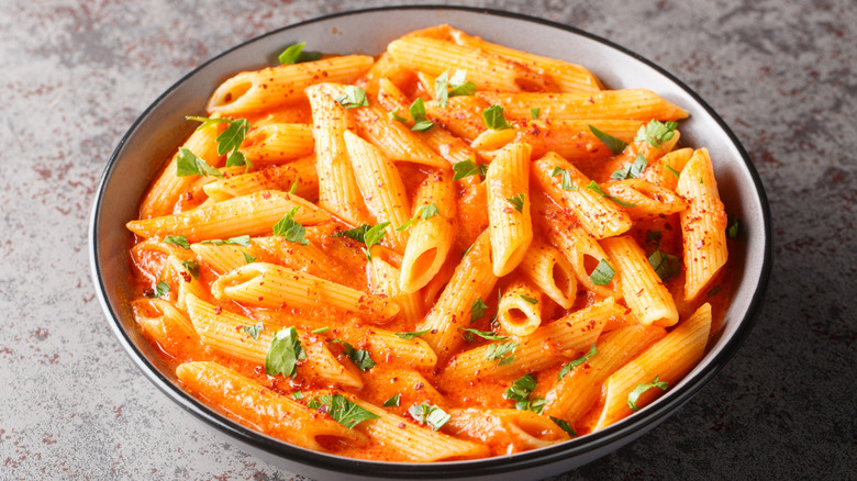 Pasta in tomato and cream cheese sauce