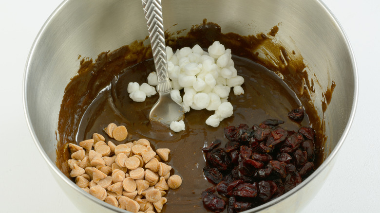 mixing marshmallows into cake batter