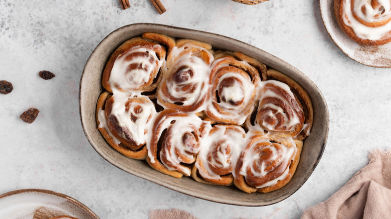 A baking dish with homemade cinnamon rolls