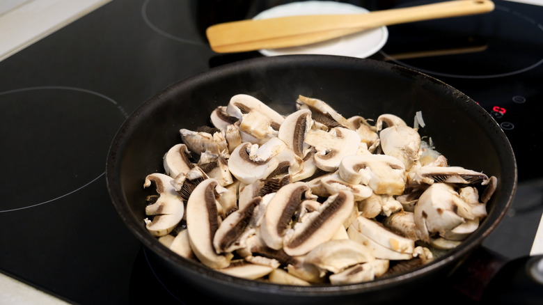 Sliced mushrooms in a pan