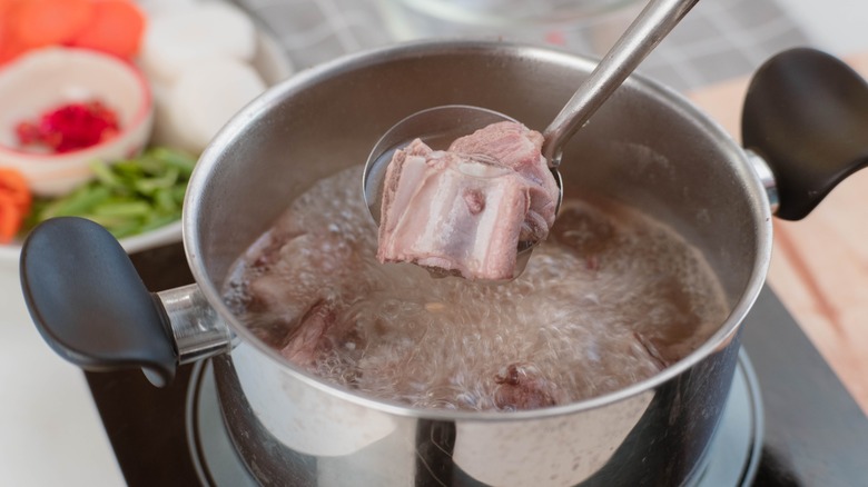 pot with boiling broth