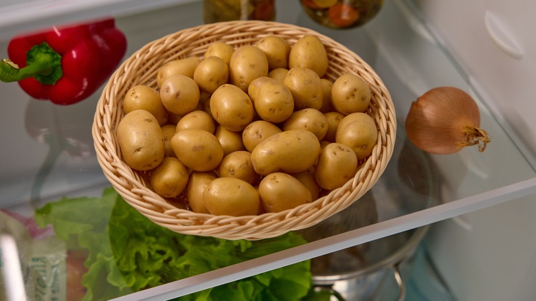 basket of potatoes in fridge