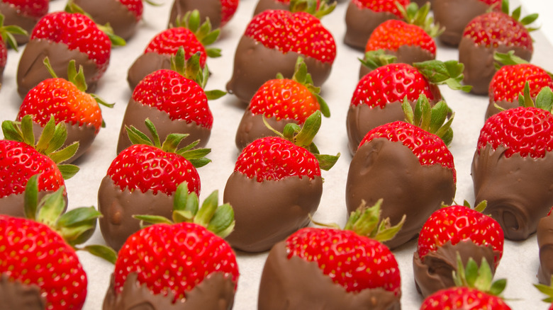 A platter of chocolate-covered strawberries