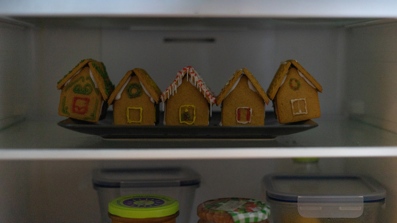 Five gingerbread houses in the fridge