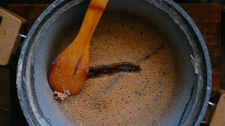 A pot with burnt milk