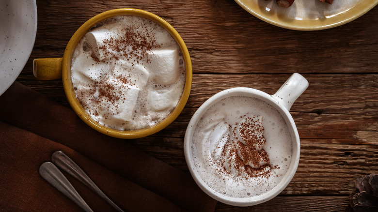 Two mugs with hot chocolate