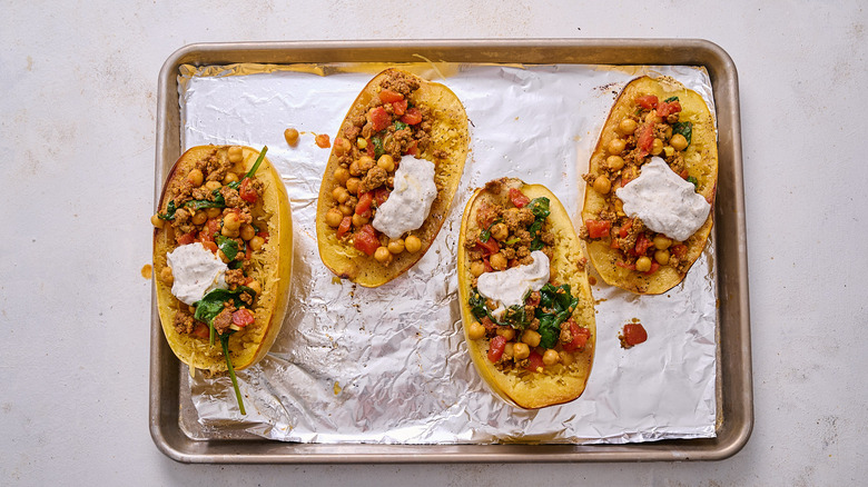 spaghetti squash filled with lamb on table