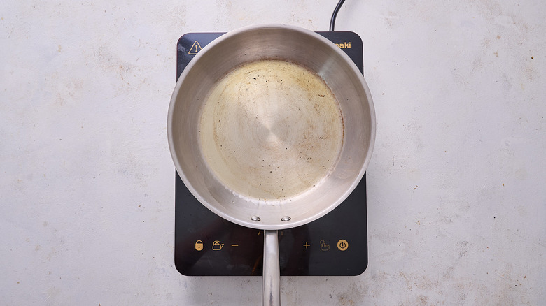 heating oil in skillet