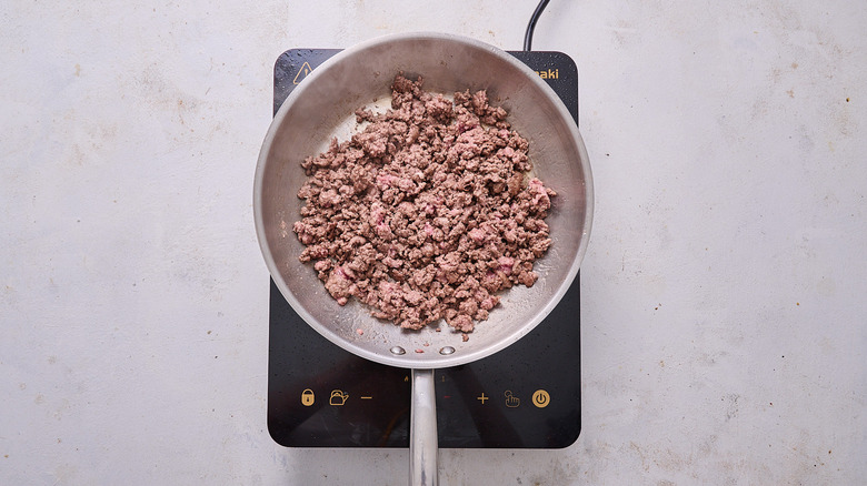 ground lamb browning in skillet