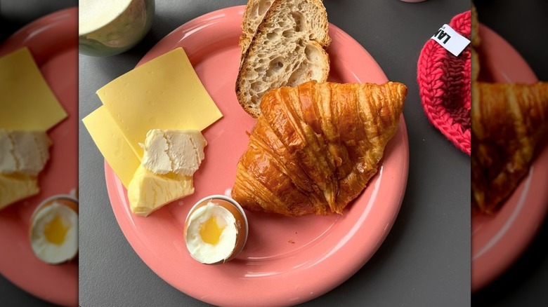 A Chunky Plate with cheese, egg, and croissant