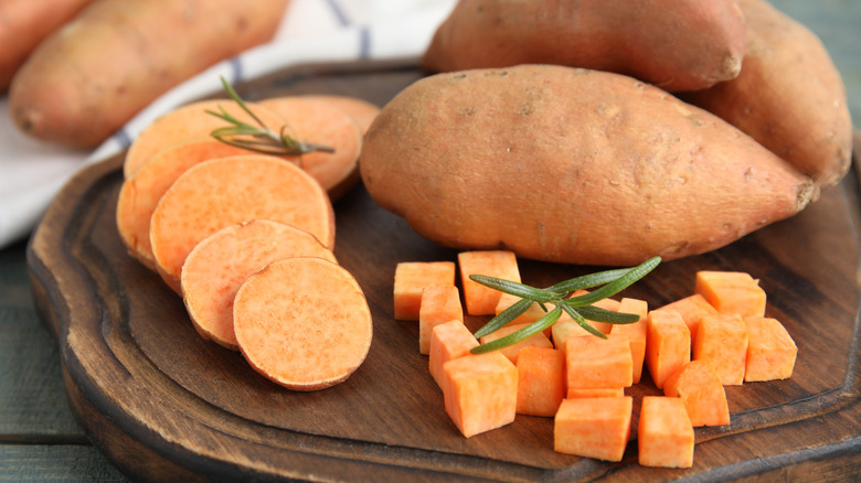 Whole, sliced, and cubed sweet potatoes. 