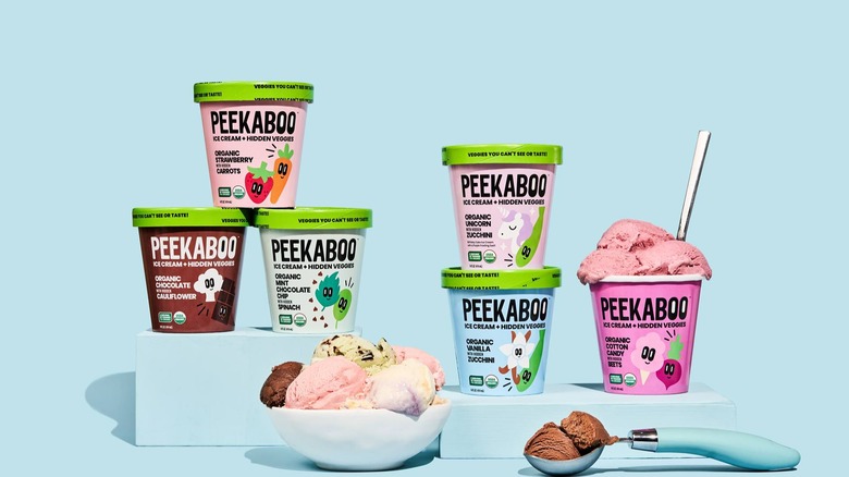 Stacked pints of Peekaboo Ice Cream against a blue background