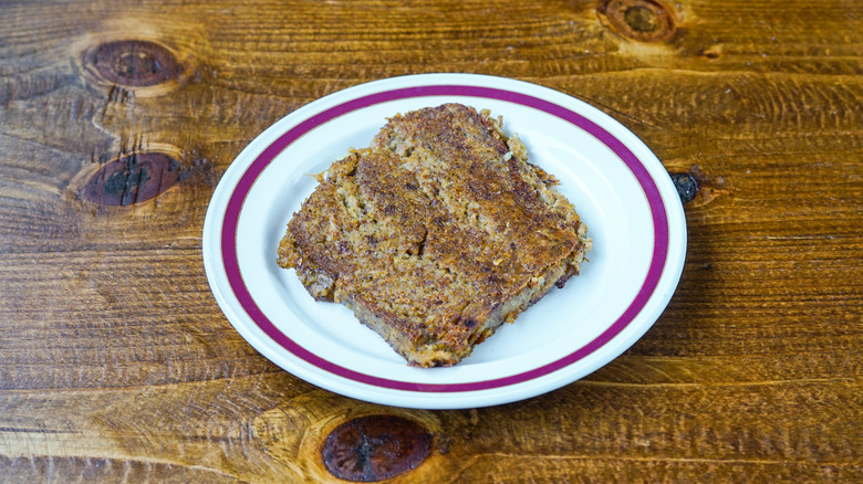 A slice of scrapple on a plate