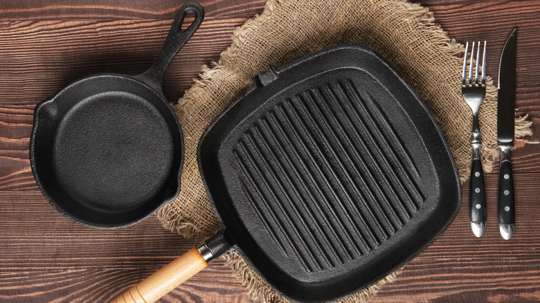 Cast iron pans on a table