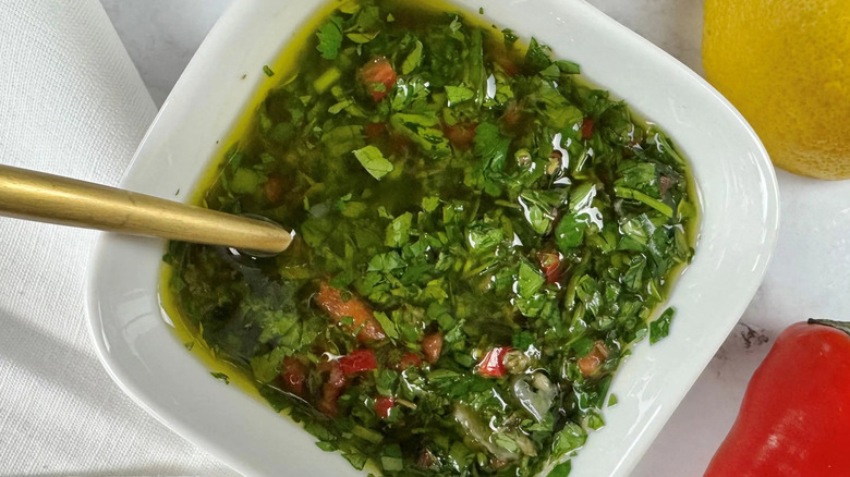 Chimichurri in white bowl