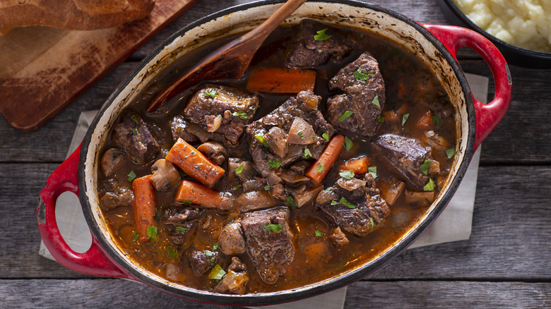 Beef stew with vegetables in a Dutch oven