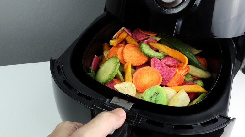 Vegetables in air fryer basket