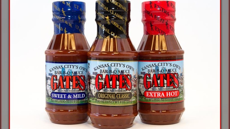 three bottles of gates barbecue sauce